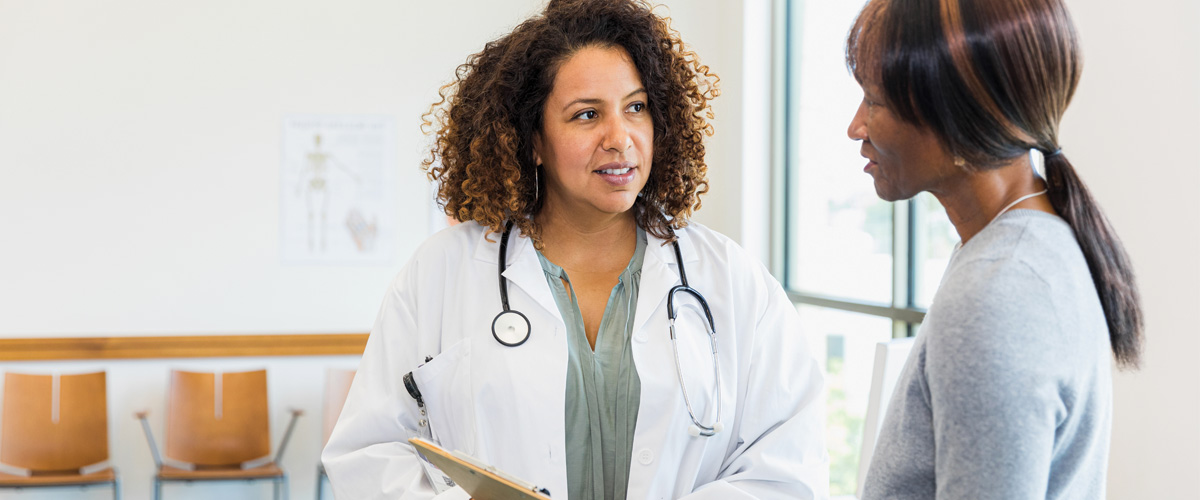 Doctor talking to their patient.